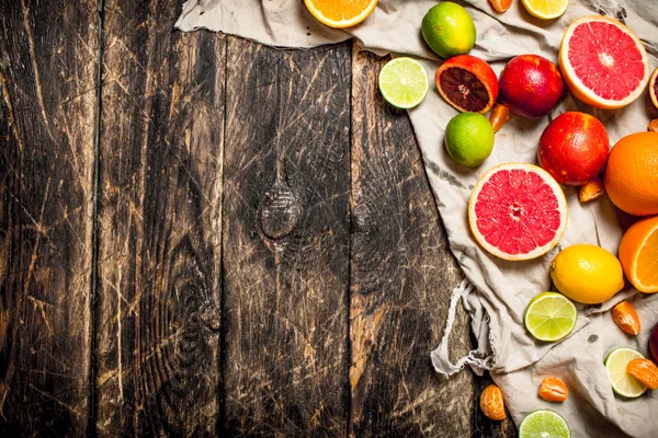 Citrus background. Citrus fruit on the old fabric.