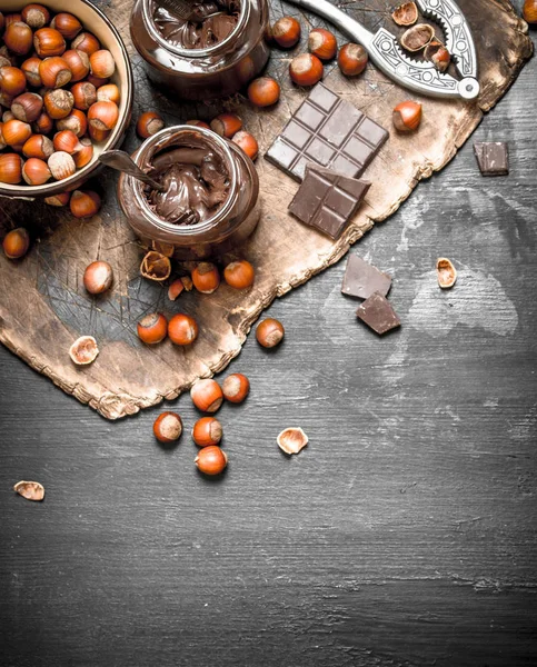 Chocolate butter with hazelnuts. — Stock Photo, Image