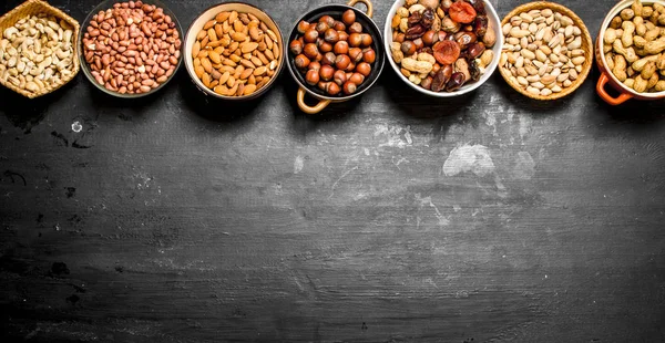 Various nuts in bowls. — Stock Photo, Image