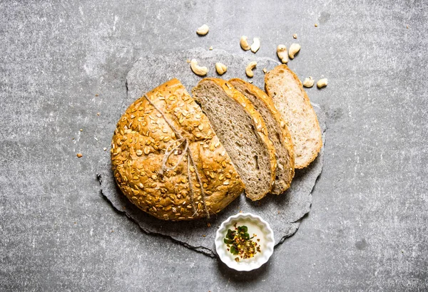 Fresh bread on a stone pedestal.  Top view