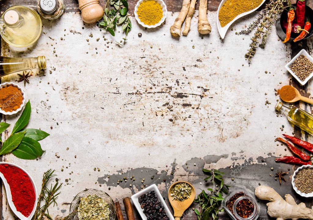 Different spices, herbs and roots view from the top. 