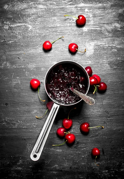 Cherry jam in a saucepan. — Stock Photo, Image