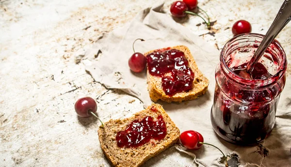 The sandwich with sour cherry jam. — Stock Photo, Image