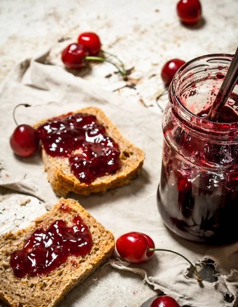 The sandwich with sour cherry jam. — Stock Photo, Image