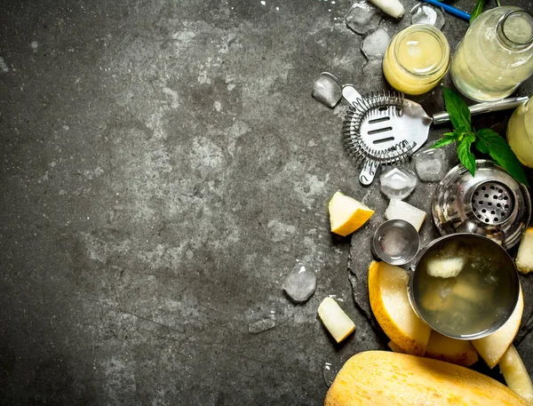 Summer cocktail of melon, mint and rum with ice. — Stock Photo, Image