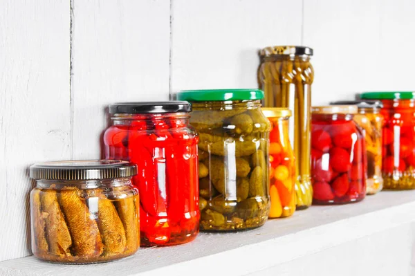 Preserved food in glass jars — Stock Photo, Image