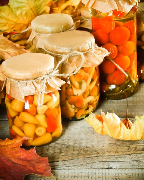 Autumn concept. Preserved food in glass jars