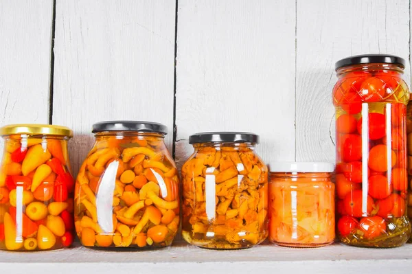 Preserved food in glass jars — Stock Photo, Image