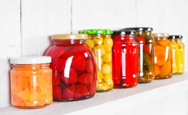 Preserved food in glass jars — Stock Photo, Image