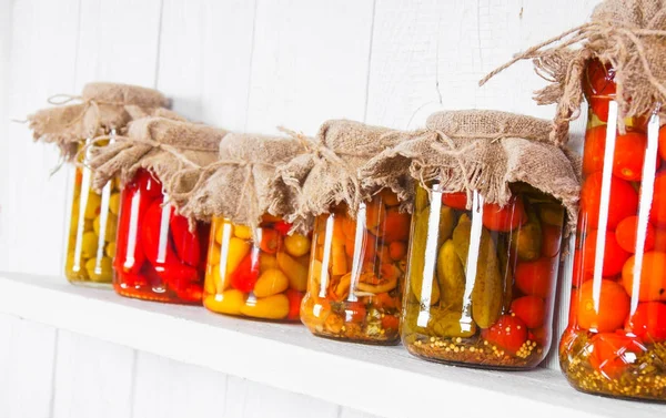 Preserved food in glass jars — Stock Photo, Image