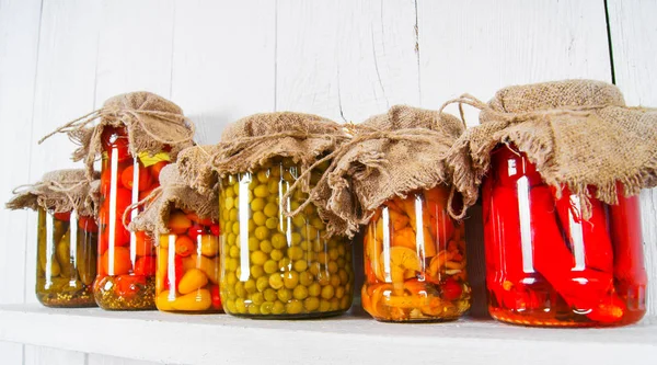 Preserved food in glass jars — Stock Photo, Image