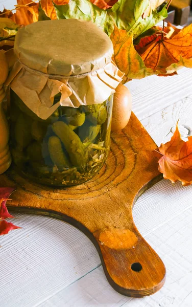 Autumn concept. Preserved food in glass jar