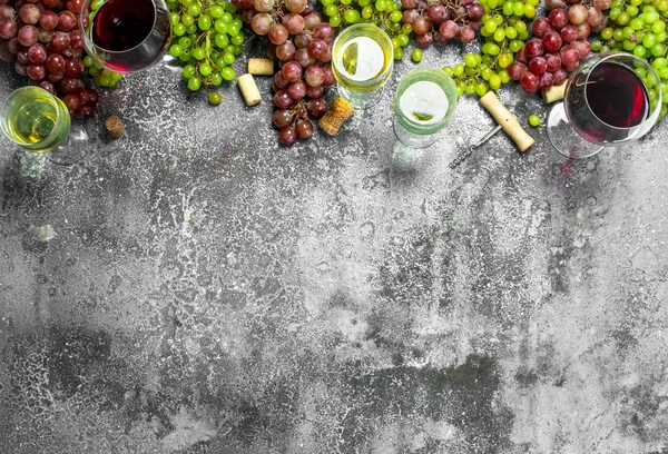 Wine background. Red and white wine from fresh grapes.