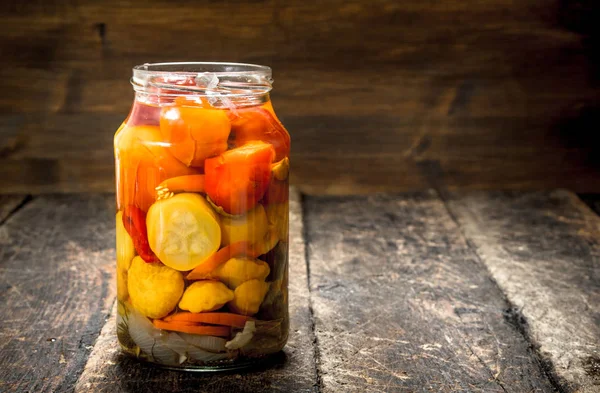 Marinated tomatoes in glass jar. — Stock Photo, Image