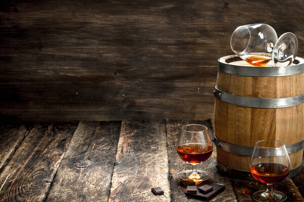 barrel with glasses of French cognac.