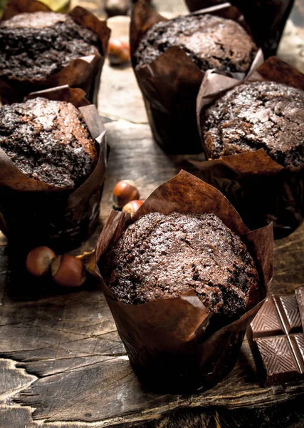 Chocolate muffins on the board.