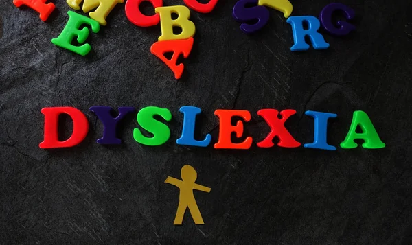 Dyslexic child play letters — Stock Photo, Image