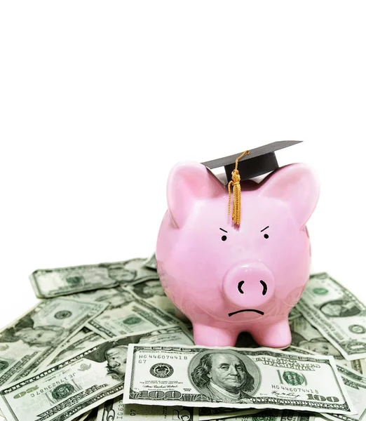 Angry piggy bank with graduation cap — Stock Photo, Image