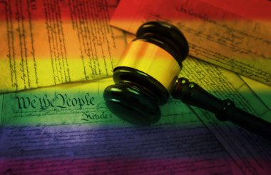 Rainbow flag gavel on America's Constitution clipart