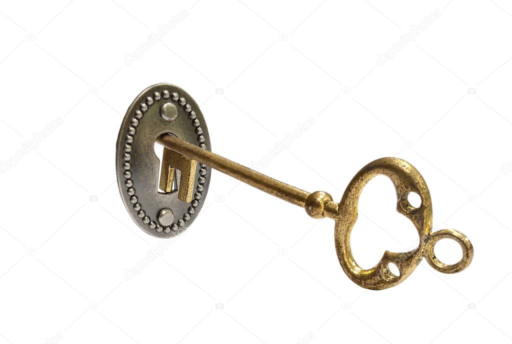 Gold key on white