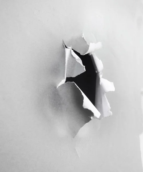 Side view paper hole tear — Stock Photo, Image