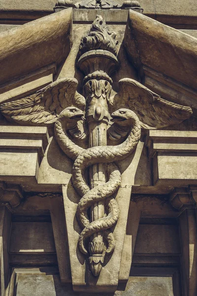 Carved caduceus symbol — Stock Photo, Image