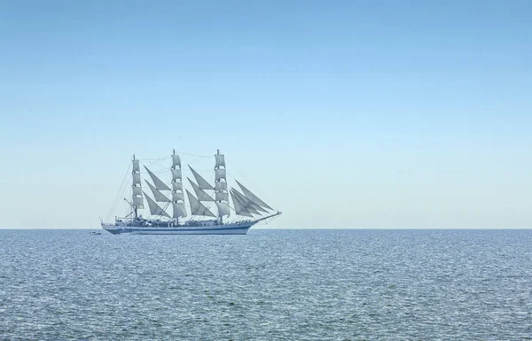 Three masted windjammer in full sails