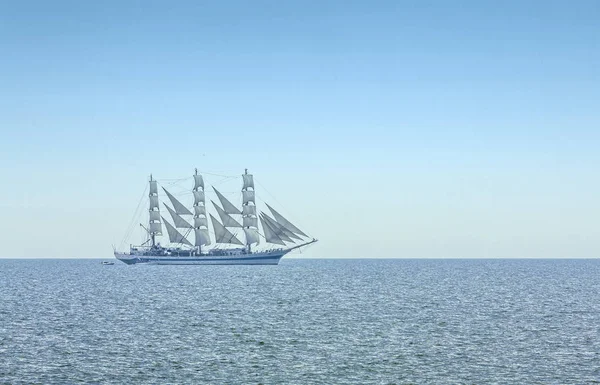 Three masted windjammer in full sails Stock Picture