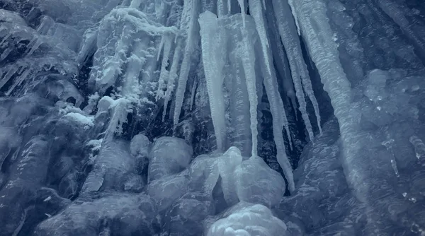 Vertical icicles in a cavern Stock Image