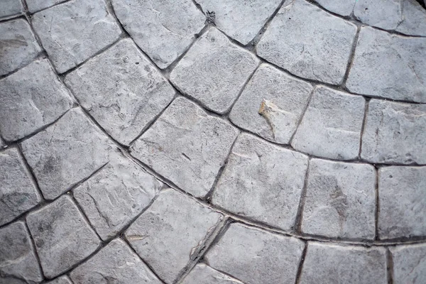 Eski vintage kaba tuğla geçit (patika, kaldırım) sokak arka plan veya doku - inşaat kavramı.