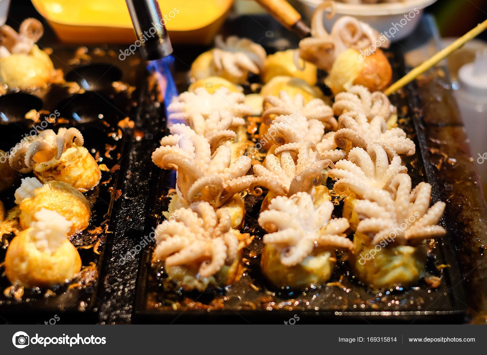 Fire Cooking Burning For Baby Octopus In Takoyaki Japanese Balls On Black Stove Japanese Food Background Or Texture Stock Photo Image By C Nawanthorn21 Fire Cooking Burning For Baby Octopus In Takoyaki Japanese Balls On Black Stove Japanese Food Background Or Texture Stock Photo Image By C Nawanthorn21