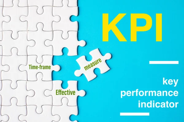 Many White Jigsaw Puzzle Kpi Key Performance Indicator Word Blue Royalty Free Stock Images
