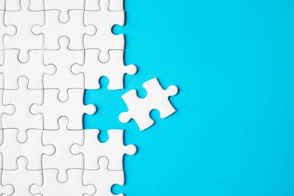 Many White Jigsaw Puzzle Blue Background Idea Solution Concept Royalty Free Stock Images