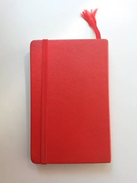 Libro Con Copertina Arancione Segnalibro Tessuto Sfondo Grigio — Foto Stock