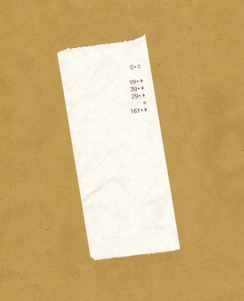 bill or receipt isolated over light brown background