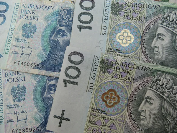 Lengyel zloty-bankjegyek és -érmék — Stock Fotó