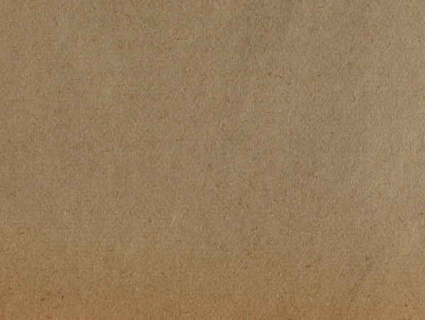 Светло-коричневый фон поверхности бумаги — стоковое фото