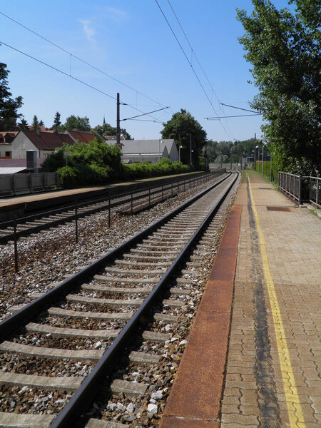Railway tracks and platform perspective near Vienna, Austria