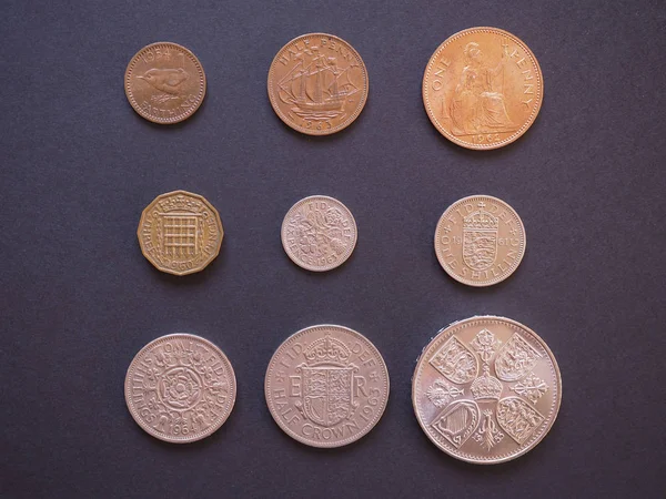 LONDON, UK - CIRCA DECEMBER 2014: Full range of Predecimal British Pound coins, withdrawn on Decimal Day, i.e. 15 February 1971