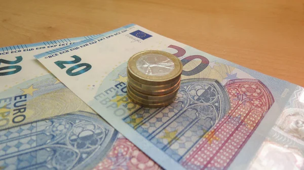 Euro (EUR) banknotes and coins, currency of European Union (EU)