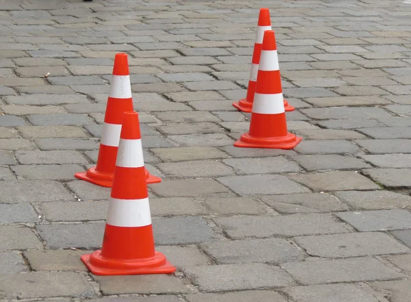 Traffic cones aka construction cones, witch\'s hat, pylons, road cones, highway cones, safety cones,