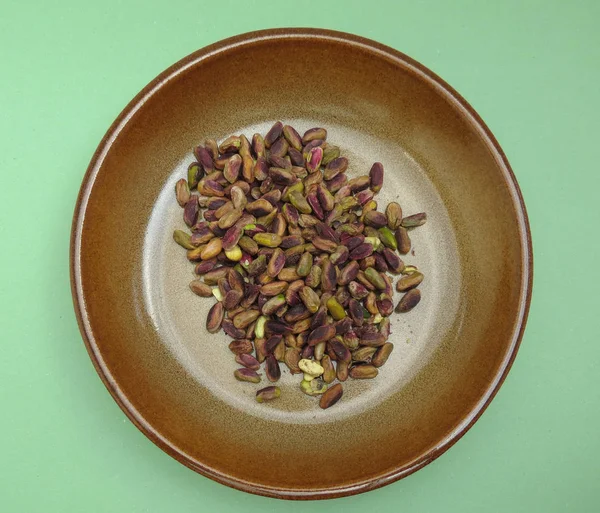 Pistachios nuts raw food in a dish