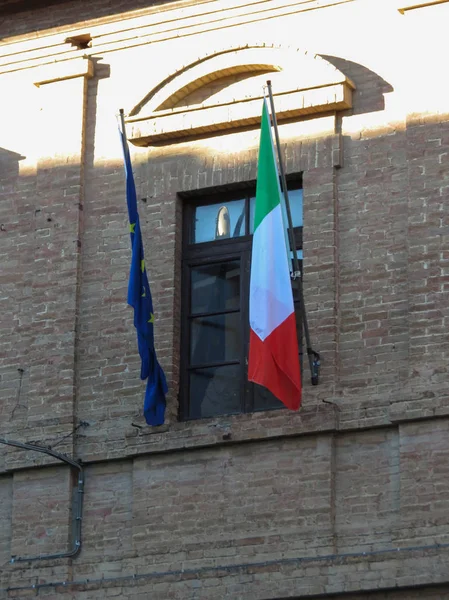 Italian national flag of Italy and European Union flag