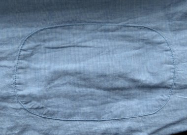 hafif mavi pamuklu kumaş dokulu arka plan olarak yararlı yama ve