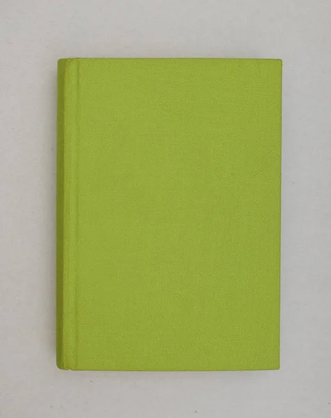 Livro Com Capa Tecido Verde Sobre Fundo Cinza — Fotografia de Stock