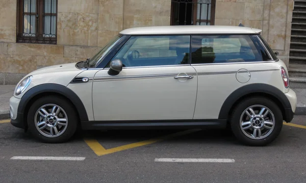 Off white Mini Cooper car parked in Salamanca — Stock Photo, Image