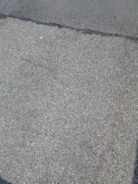 Siyah asfalt yüzeye bir arka plan olarak yararlı