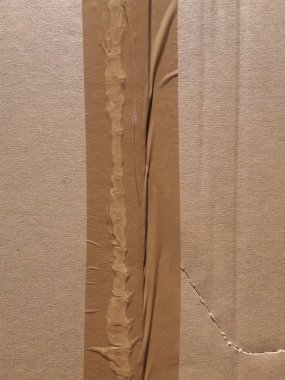 yapışkan bant bant dokulu bir arka plan olarak yararlı kahverengi oluklu karton