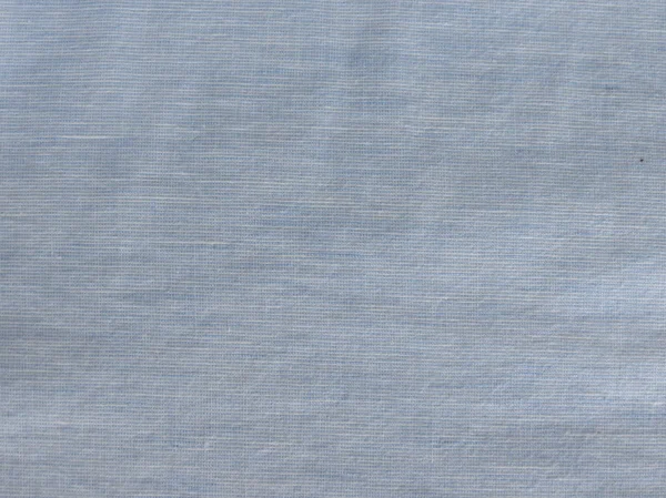軽い青い綿の生地テクスチャ背景として役に立つ — ストック写真