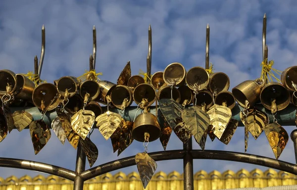 Traditional Buddhist wind bells hanging near Golden Rock, Myanma